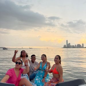 ATARDECER EN BOTE POR LA BAHIA